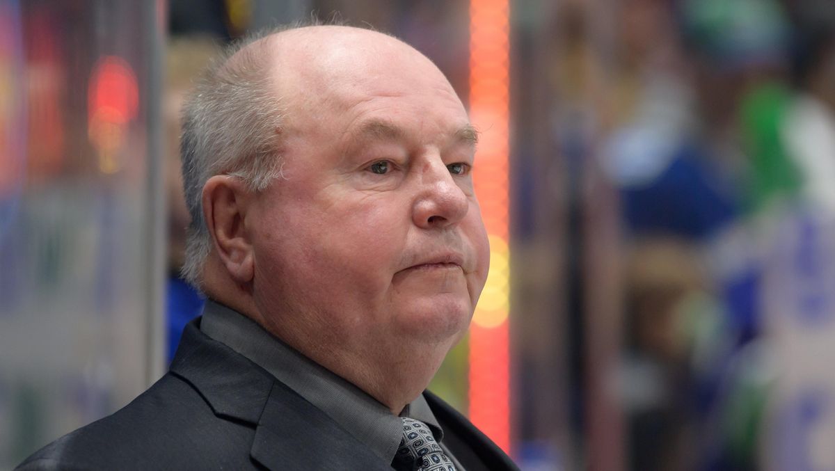 The Vancouver Canucks fired Bruce Boudreau in the most publicly embarrassing way possible.