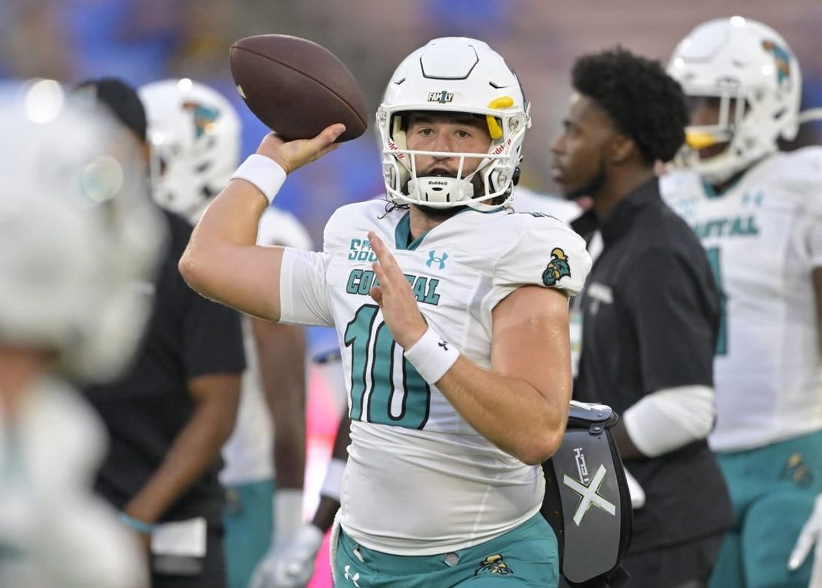 Sep 2, 2023; Pasadena, California, USA;  Coastal Carolina Chanticleers quarterback Grayson McCall (10) warms up prior to the game against the UCLA Bruins at Rose Bowl.