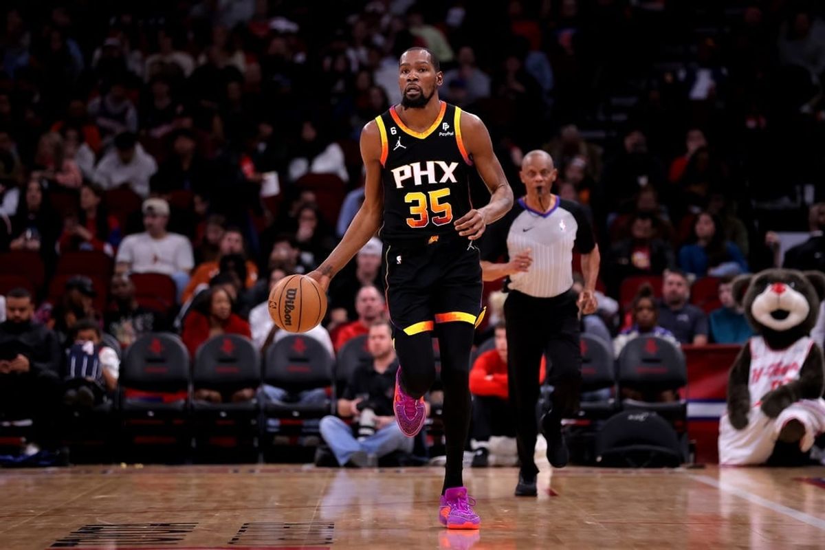Dec 27, 2023; Houston, Texas, USA; Phoenix Suns forward Kevin Durant (35) handles the ball against the Houston Rockets during the third quarter at Toyota Center.