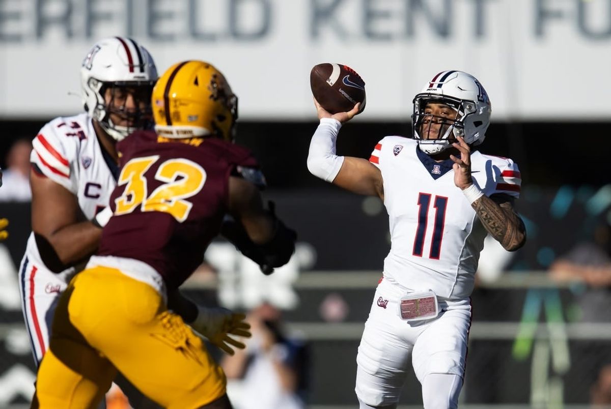 Nov 25, 2023; Tempe, Arizona, USA; Arizona Wildcats quarterback Noah Fifita (11) against the Arizona State Sun Devils in the first half of the Territorial Cup at Mountain America Stadium.