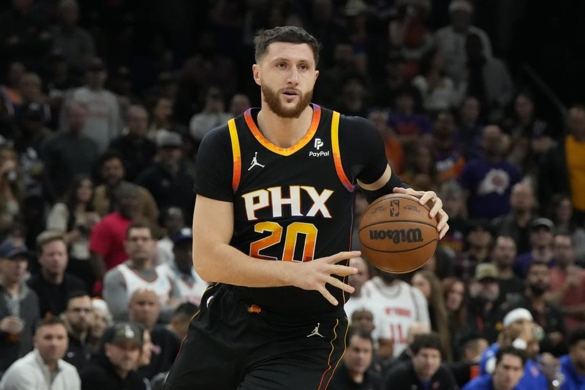 Dec 15, 2023; Phoenix, Arizona, USA; Phoenix Suns center Jusuf Nurkic (20) drives on the New York Knicks in the second half at Footprint Center.