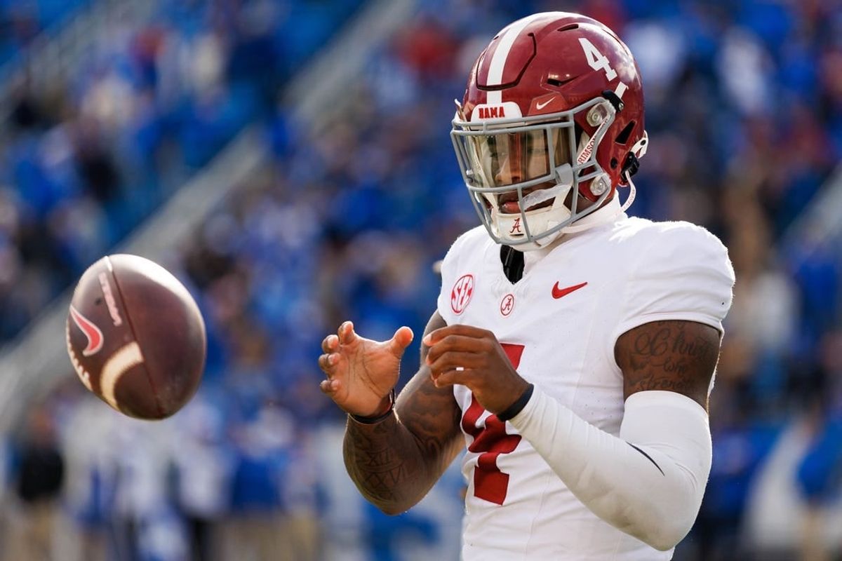 Nov 11, 2023; Lexington, Kentucky, USA; Alabama Crimson Tide quarterback Jalen Milroe (4) warms up during a timeout during the third quarter against the Kentucky Wildcats at Kroger Field.