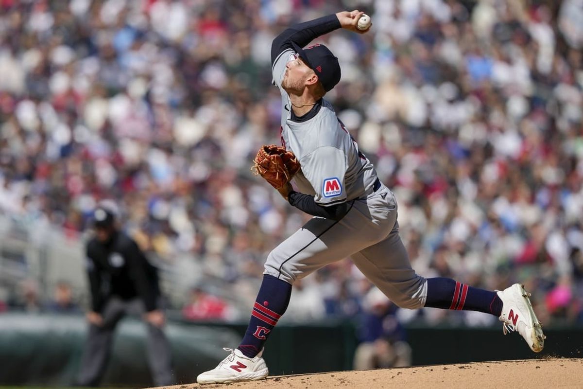 Apr 4, 2024; Minneapolis, Minnesota, USA; Cleveland Guardians starting pitcher Tanner Bibee (28) delivers a pitch during the first inning against the Minnesota Twins at Target Field.
