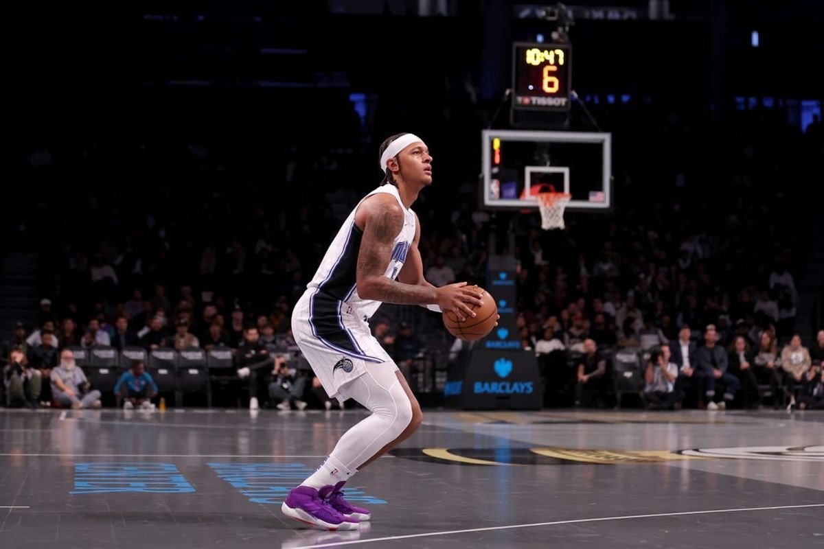 Nov 14, 2023; Brooklyn, New York, USA; Orlando Magic forward Paolo Banchero (5) looks to shoot the ball against the Brooklyn Nets during the first quarter at Barclays Center.