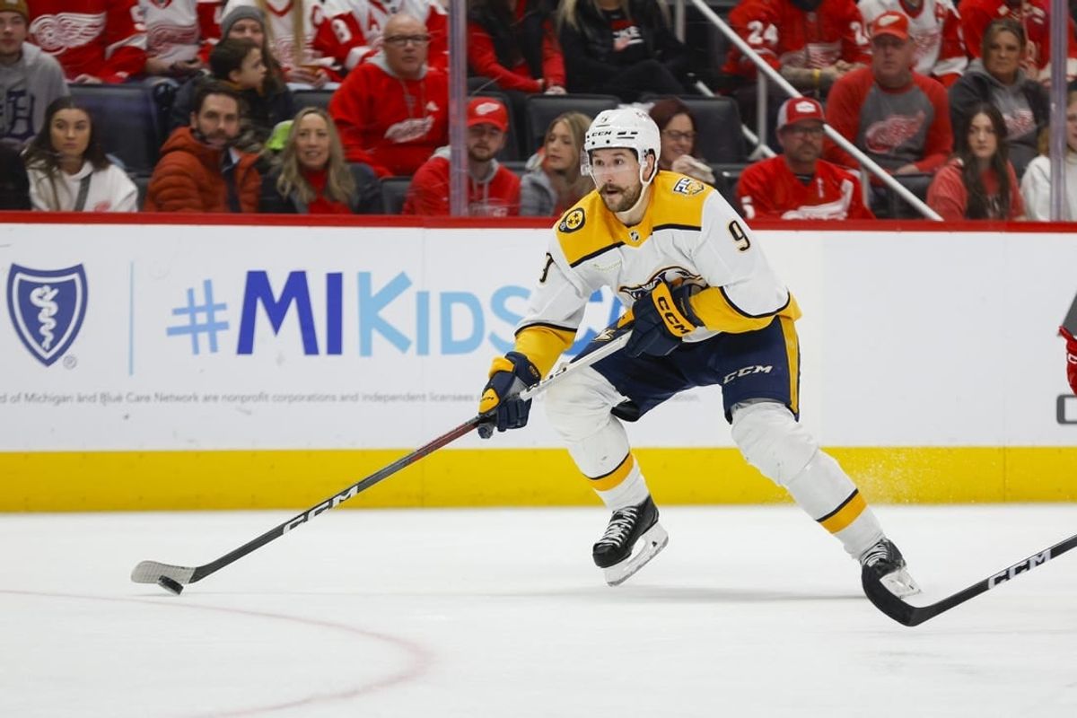 Dec 29, 2023; Detroit, Michigan, USA; Nashville Predators left wing Filip Forsberg (9) handles the puck during the third period of the game between the Detroit Red Wings and the Nashville Predators at Little Caesars Arena.