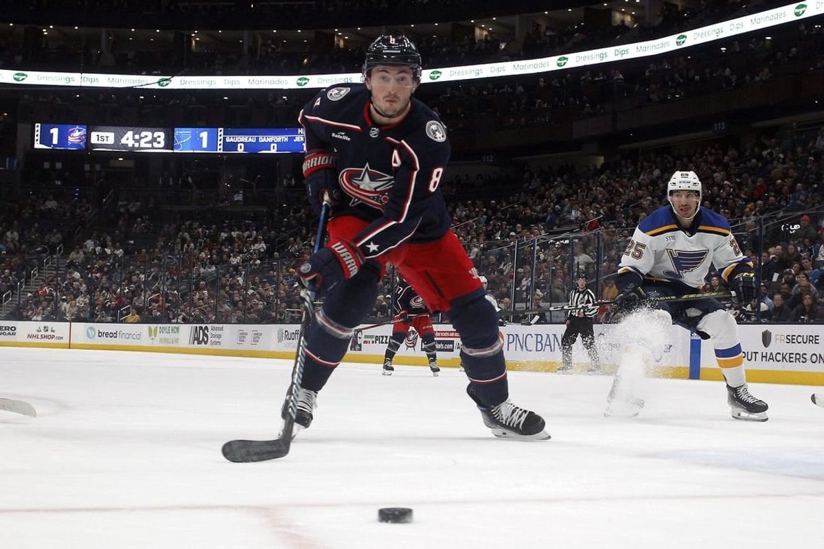 Dec 8, 2023; Columbus, Ohio, USA; Columbus Blue Jackets defenseman Zach Werenski (8) tracks down a loose puck against the St. Louis Blues during the first period at Nationwide Arena.