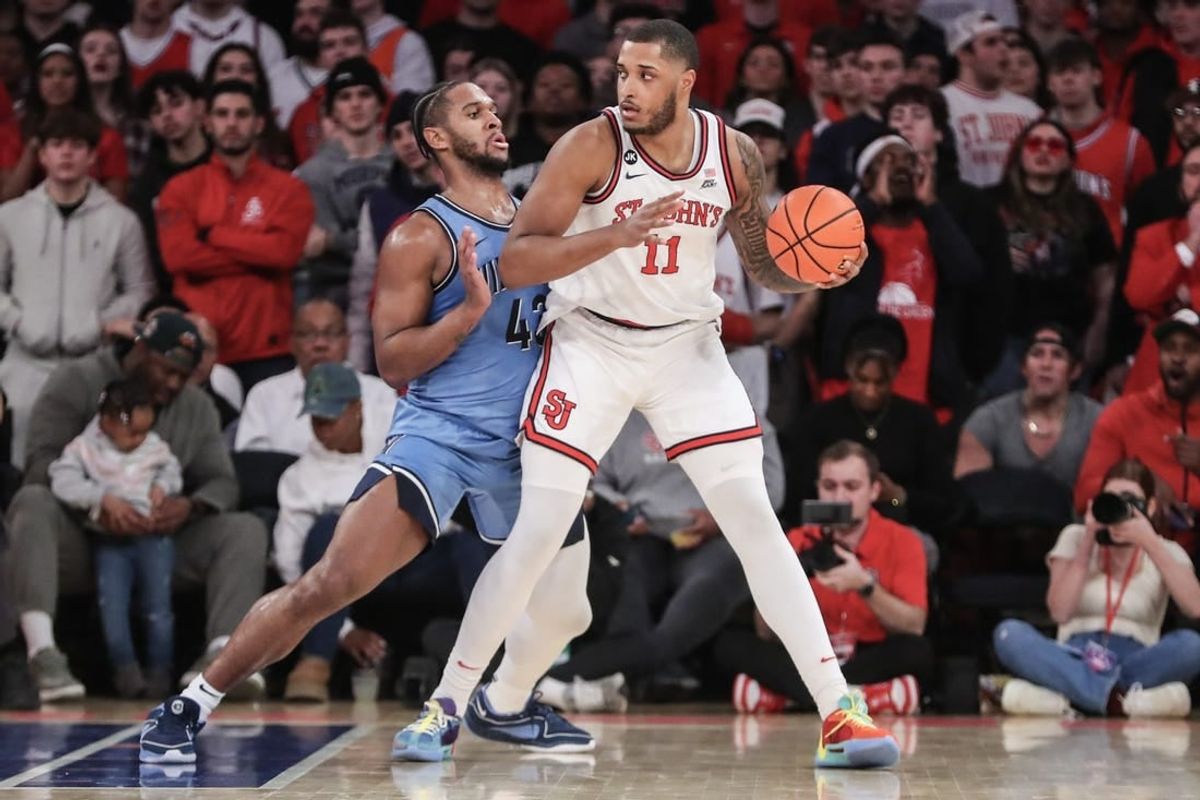 Jan 24, 2024; New York, New York, USA;  St. John's Red Storm center Joel Soriano (11) looks to post up against Villanova Wildcats forward Eric Dixon (43) in the first half at Madison Square Garden.