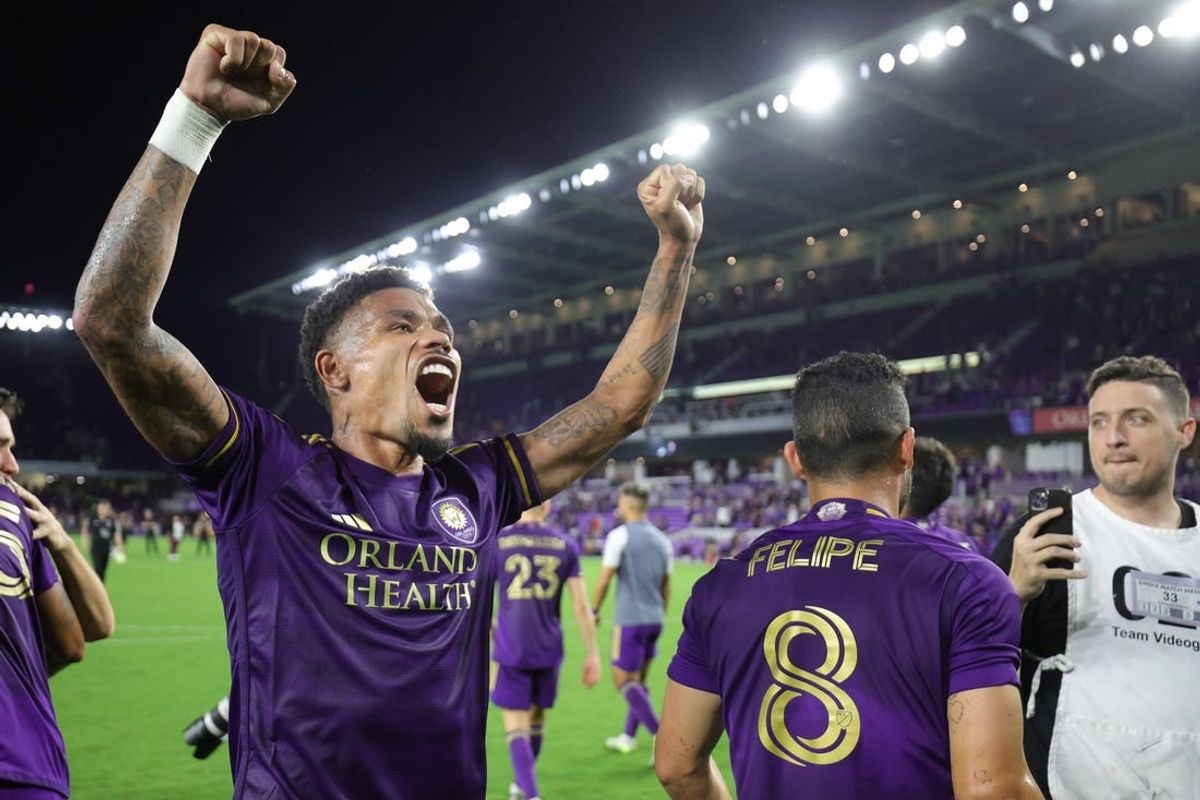 Oct 30, 2023; Orlando, Florida, USA; Orlando City midfielder Junior Urso (21) signals to fans after defeating the Nashville SC of game one in a round one match of the 2023 MLS Cup Playoffs at Exploria Stadium.