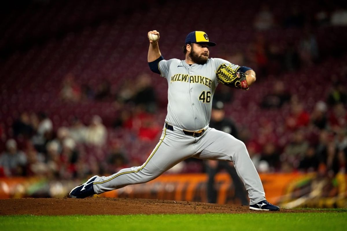 Milwaukee Brewers pitcher Bryse Wilson (46) pitches in the fifth inning of the MLB baseball game between Milwaukee Brewers and Cincinnati Reds at Great American Ball Park in Cincinnati on Wednesday, April 10, 2024.
