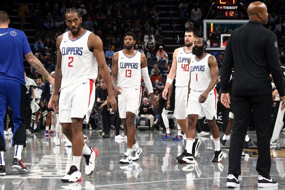 Feb 23, 2024; Memphis, Tennessee, USA; Los Angeles Clippers forward Kawhi Leonard (2), forward Paul George (13), center Ivica Zubac (40) and guard James Harden (1) walk to the bench during a time out during the second half against the Memphis Grizzlies at FedExForum.