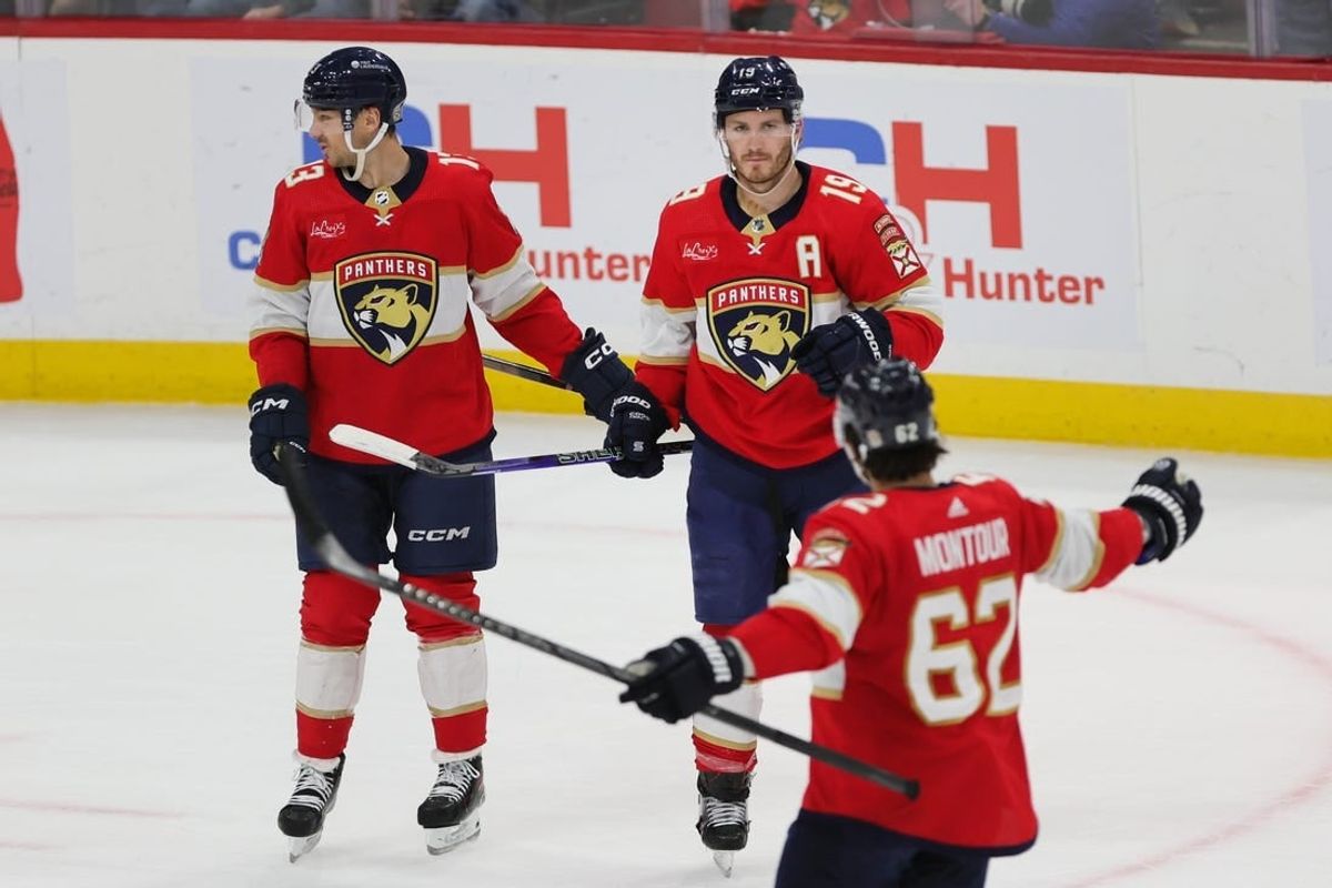 Feb 27, 2024; Sunrise, Florida, USA; Florida Panthers left wing Matthew Tkachuk (19) celebrates with center Sam Reinhart (13) and defenseman Brandon Montour (62) after scoring against the Buffalo Sabres during the first period at Amerant Bank Arena.