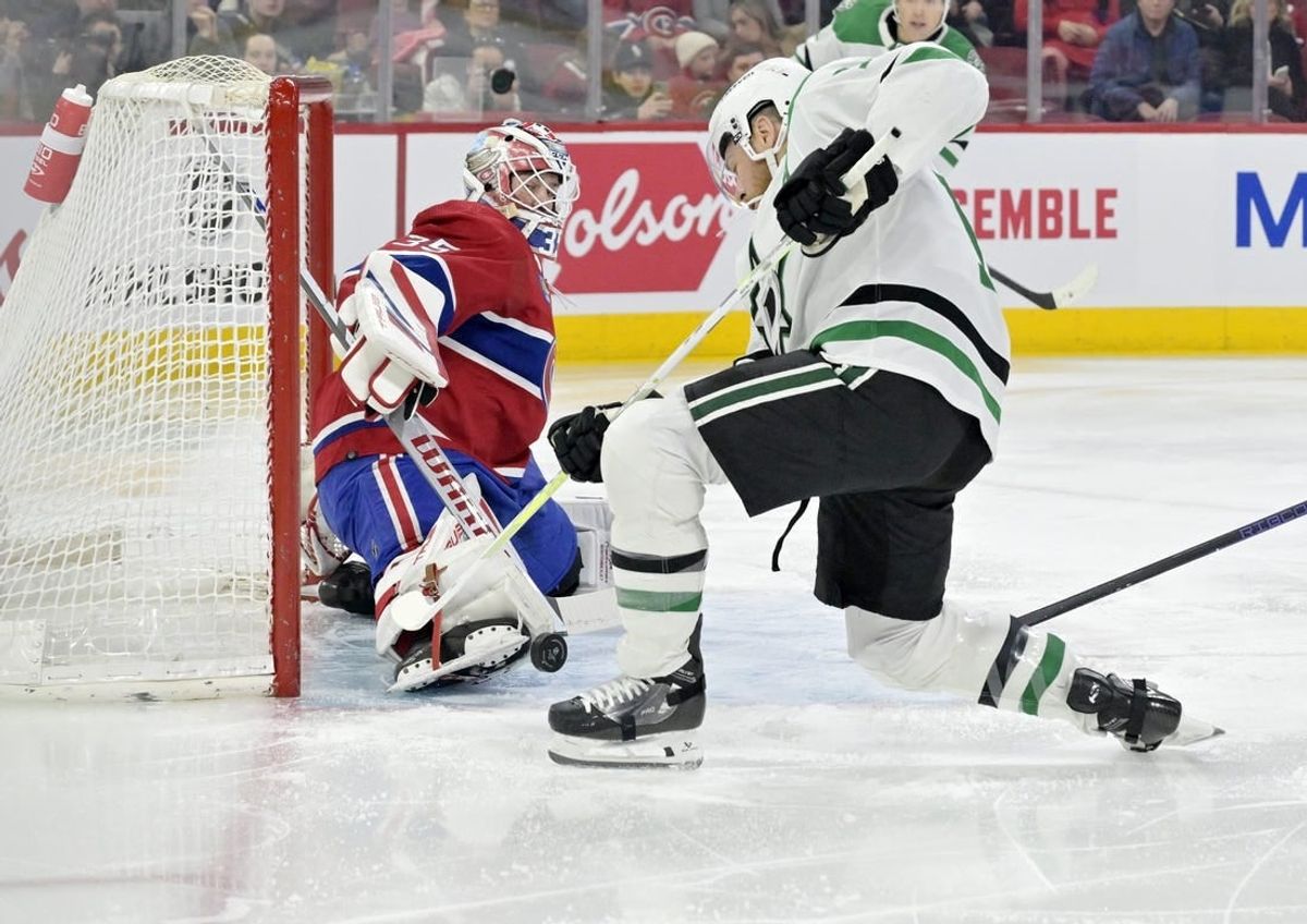 Feb 10, 2024; Montreal, Quebec, CAN; Montreal Canadiens goalie Sam Montembeault (35) makes a toe save against Dallas Stars forward Joe Pavelski (16) during the first period at the Bell Centre.