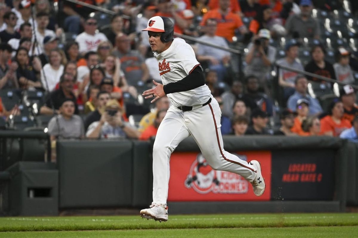 Apr 15, 2024; Baltimore, Maryland, USA;  Baltimore Orioles first baseman Ryan Mountcatle run home to score on outfielder Cedric Mullins (not pictured) sacrifice fly in the third inning against the Minnesota Twins at Oriole Park at Camden Yards.