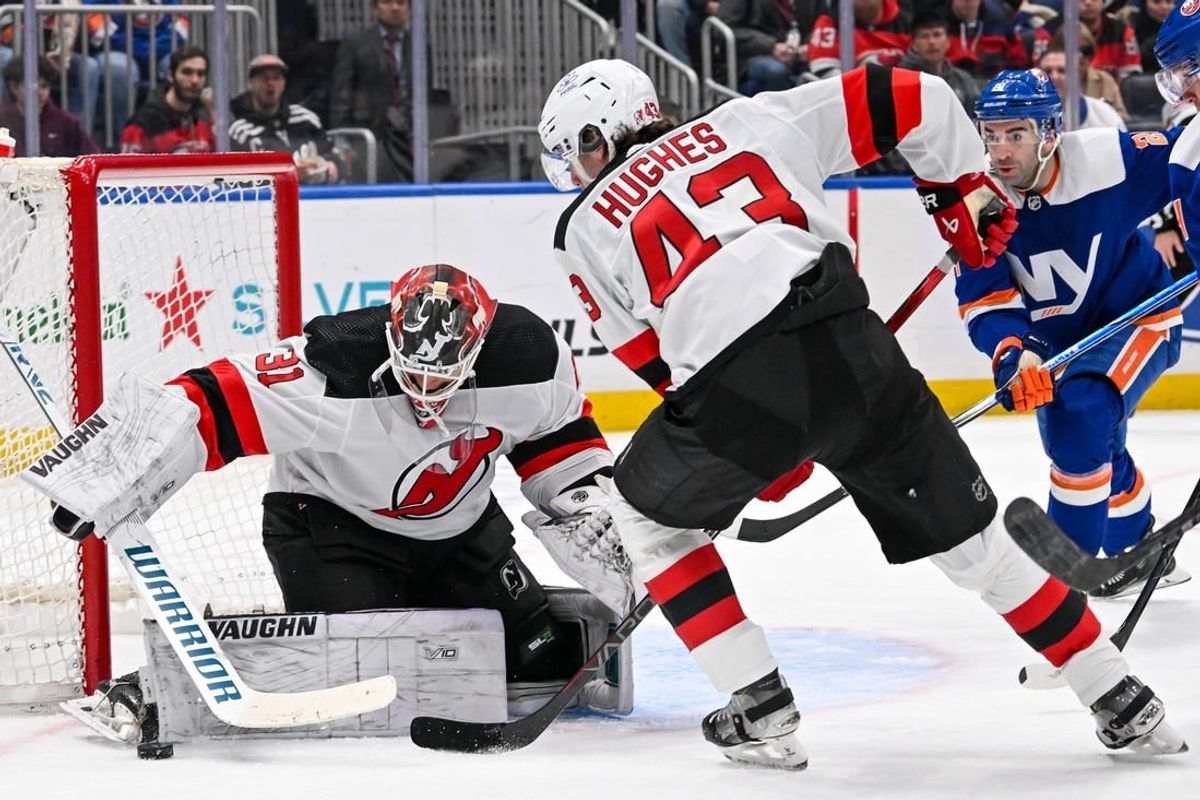 Mar 24, 2024; Elmont, New York, USA;  New Jersey Devils goaltender Kaapo Kahkonen (31) makes a save against the New York Islanders during the second period at UBS Arena.