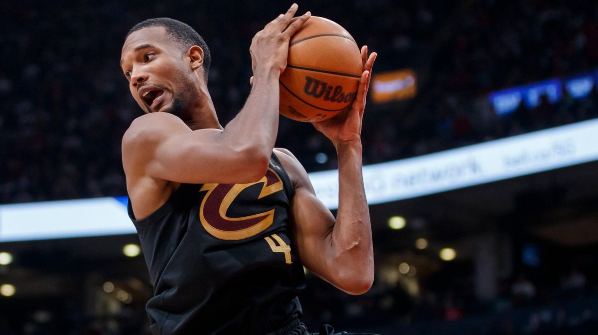 The Cavs’ Evan Mobley grabs a rebound during the second half of their NBA game against the Toronto Raptors at Scotiabank Arena on Oct.  19, 2022,  in Toronto, Canada.