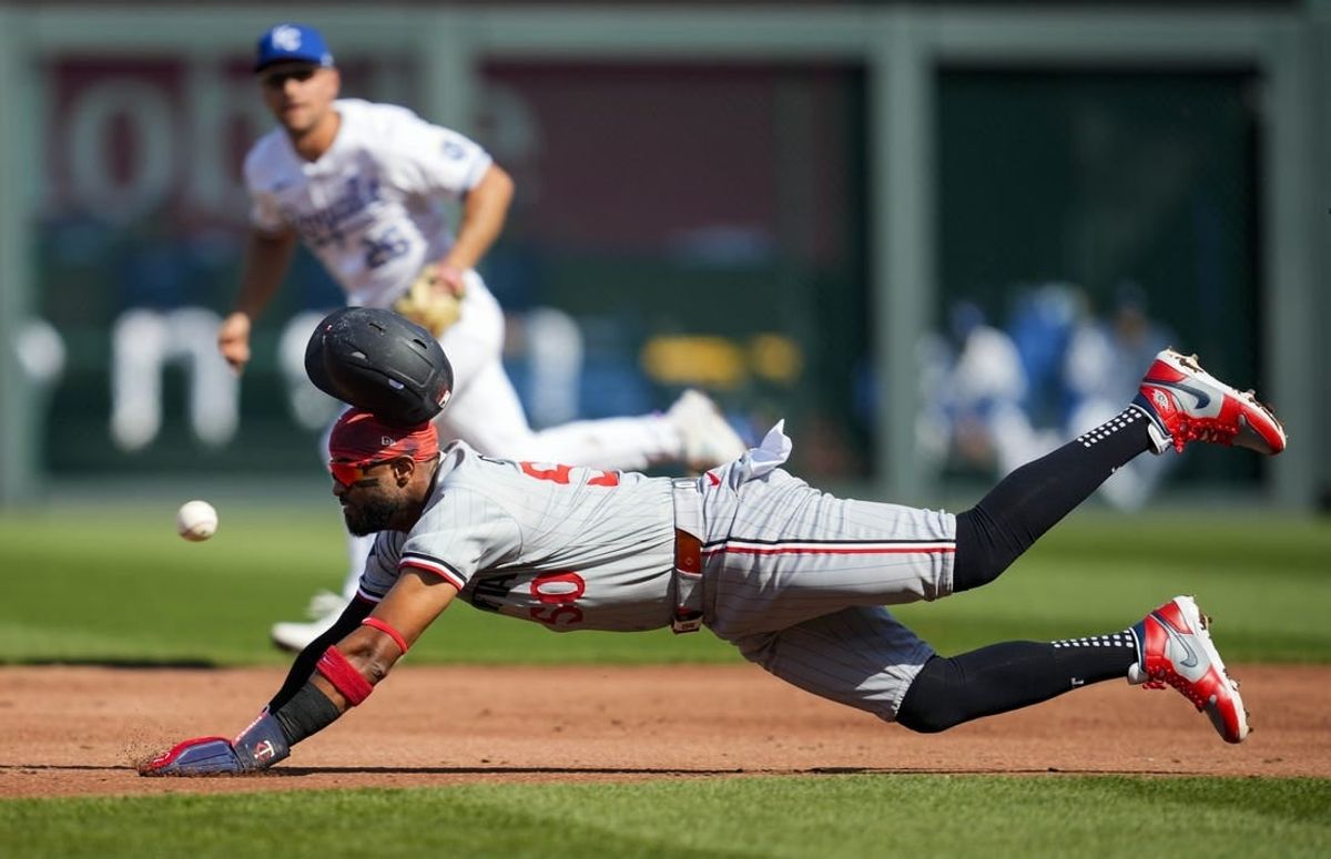 Mar 30, 2024; Kansas City, Missouri, USA; Minnesota Twins third baseman Willi Castro (50) is caught stealing second base against the Kansas City Royals during the third inning at Kauffman Stadium.