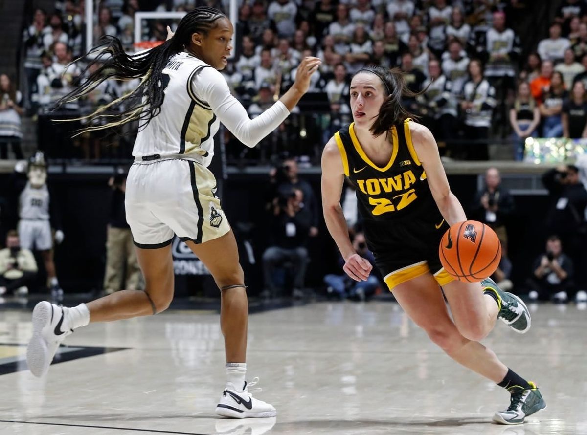 Iowa Hawkeyes guard Caitlin Clark (22) shakes Purdue's Jayla Smith at sold out Mackey Arena on Wednesday, Jan. 10.