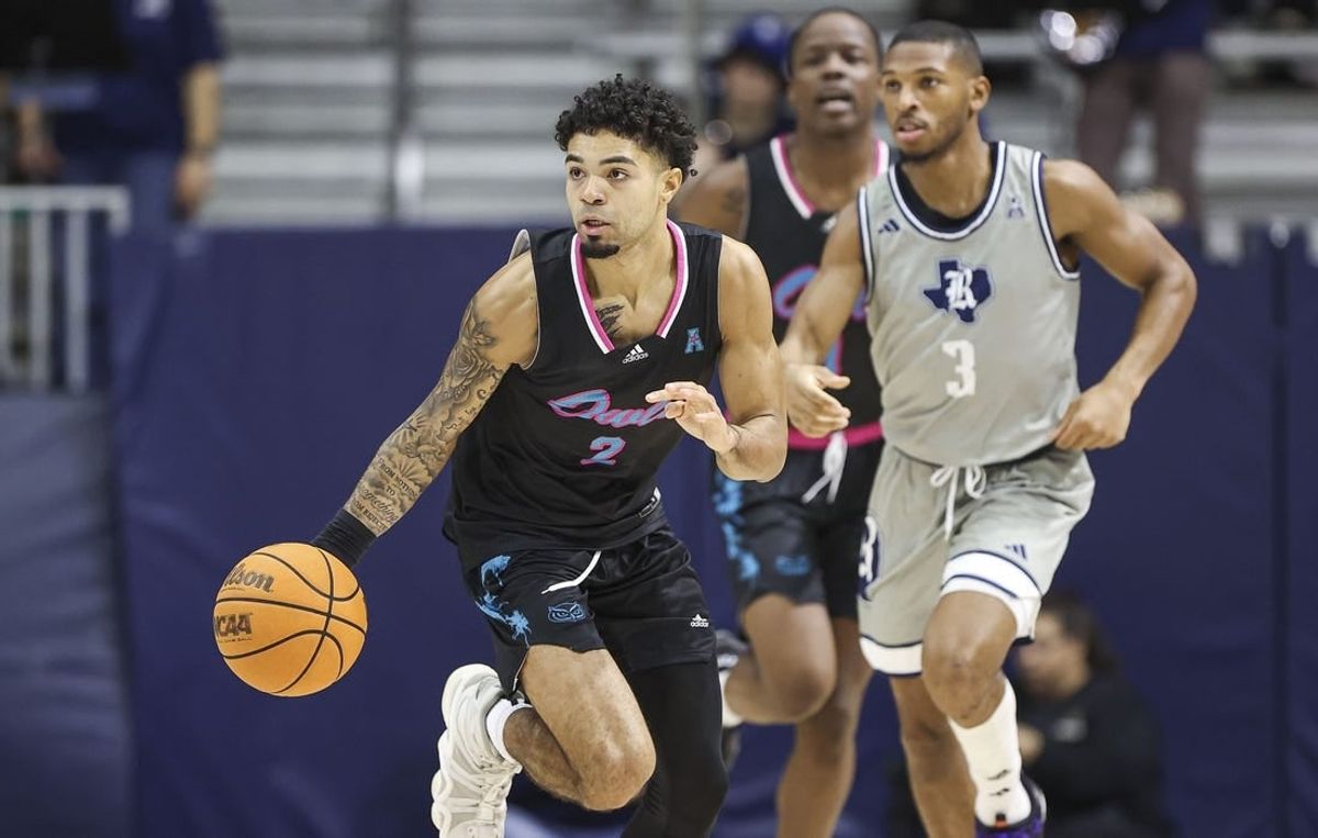 Jan 24, 2024; Houston, Texas, USA; Florida Atlantic Owls guard Nick Boyd (2) controls the ball during the first half against the Rice Owls at Tudor Fieldhouse.
