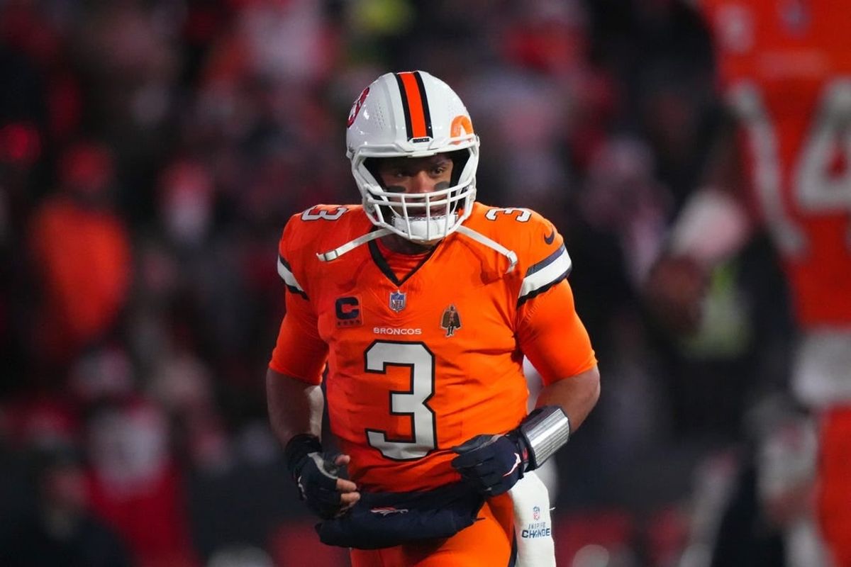 Dec 24, 2023; Denver, Colorado, USA; Denver Broncos quarterback Russell Wilson (3) before the game against the New England Patriots at Empower Field at Mile High.