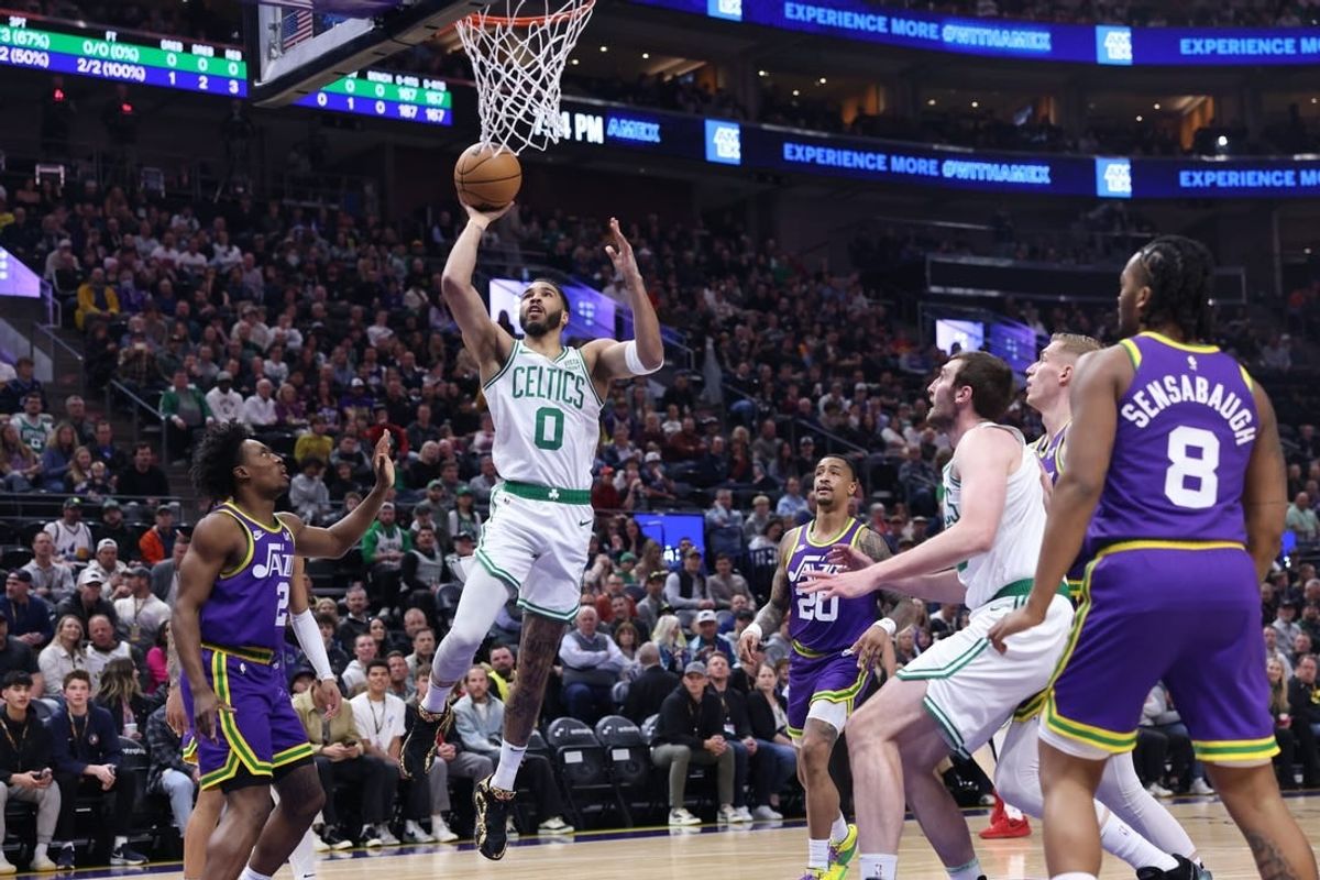 Mar 12, 2024; Salt Lake City, Utah, USA; Boston Celtics forward Jayson Tatum (0) lays the ball up against the Utah Jazz during the first quarter at Delta Center.