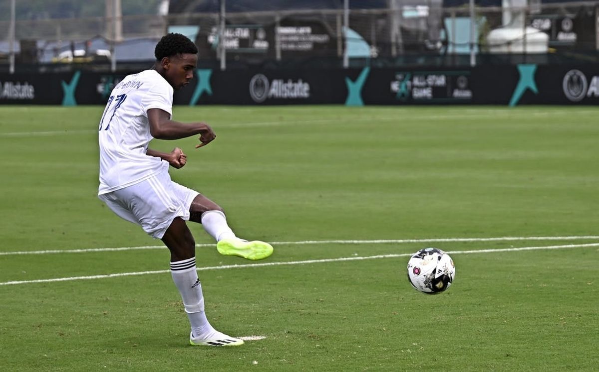 Jul 19, 2023; Annapolis, MD, USA; MLS NEXT East player Tahir Reid-Brown (17) of Orlando City SC scores on a penalty kick during a shootout in the 2023 MLS NEXT All Star Game at Glenn Warner Soccer Facility at the Naval Academy.