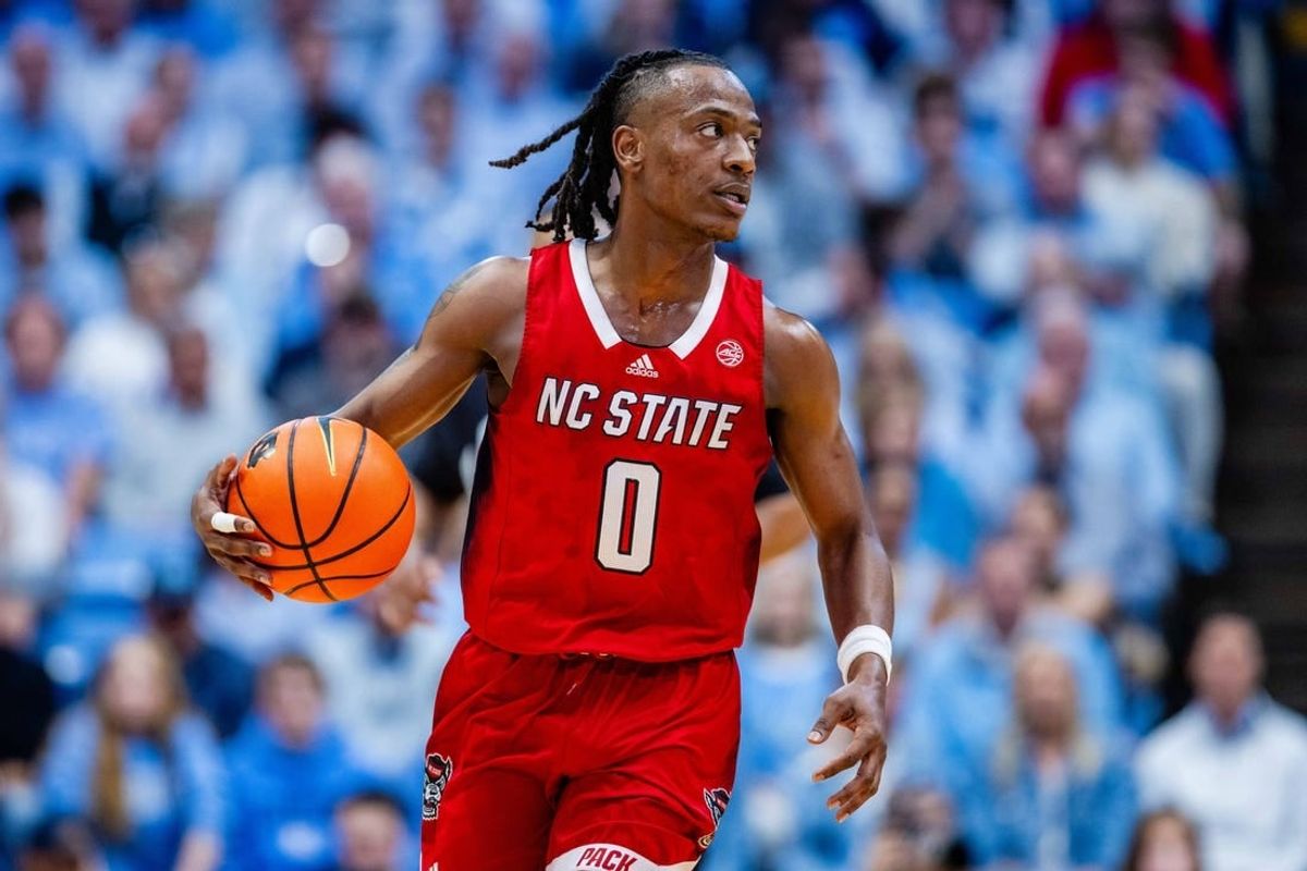 Mar 2, 2024; Chapel Hill, North Carolina, USA; North Carolina State Wolfpack guard DJ Horne (0) brings the ball up court against the North Carolina Tar Heels at Dean E. Smith Center.