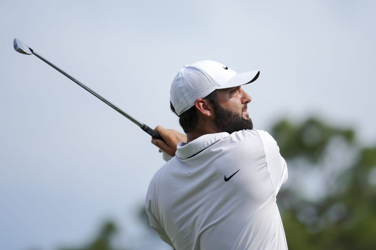 Apr 20, 2024; Hilton Head, South Carolina, USA; Scottie Scheffler plays his shot from the 17th tee during the third round of the RBC Heritage golf tournament.