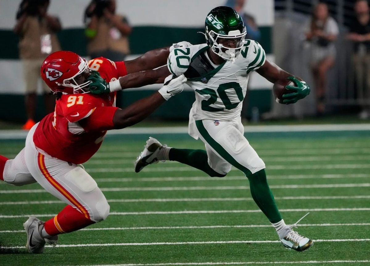Oct 1, 2023; East Rutherford, New Jersey, USA; Kansas City Chiefs defensive tackle Derrick Nnadi (91) is called for a horsecollar penalty against New York Jets running back Breece Hall (20) at MetLife Stadium.