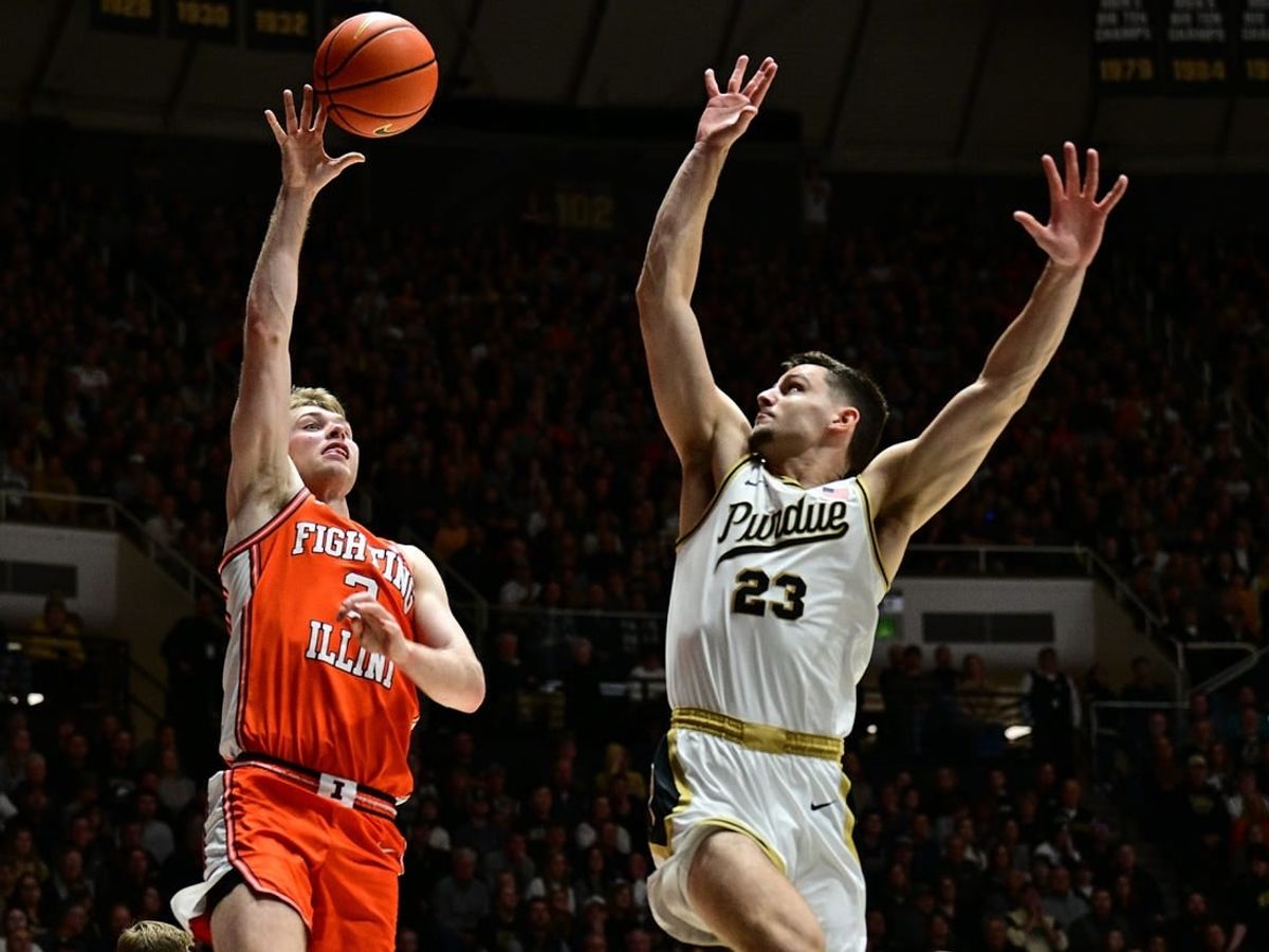 Jan 5, 2024; West Lafayette, Indiana, USA; Illinois Fighting Illini forward Marcus Domask (3) shoots the ball over Purdue Boilermakers forward Camden Heide (23) during the first half at Mackey Arena.