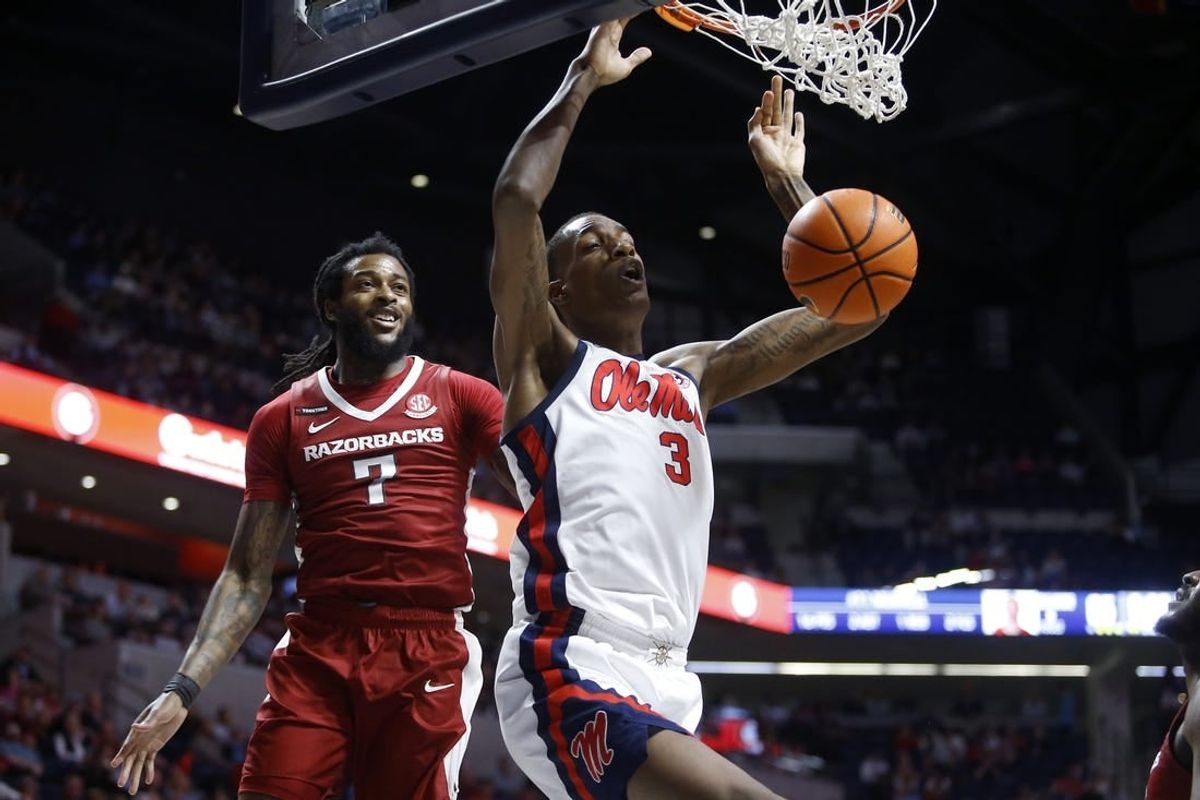 Jan 24, 2024; Oxford, Mississippi, USA; Mississippi Rebels forward Jamarion Sharp (3) dunks during the second half against the Arkansas Razorbacks at The Sandy and John Black Pavilion at Ole Miss.