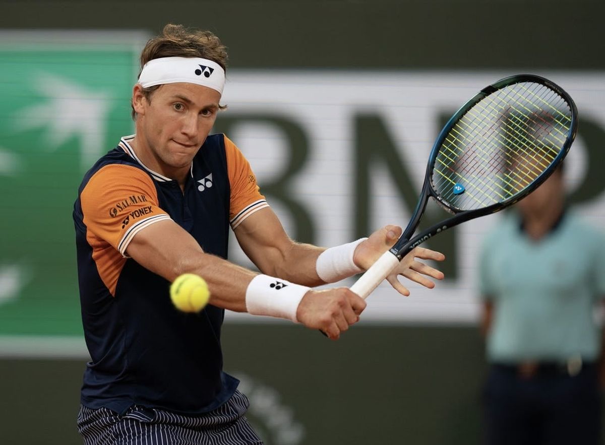 Jun 7 2023; Paris,France; Casper Ruud (NOR) returns a shot during his match against Holger Rune (DEN) on day 11 at Stade Roland-Garros.