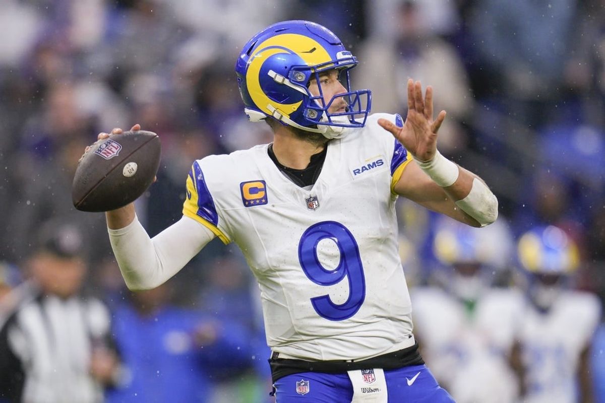 Dec 10, 2023; Baltimore, Maryland, USA;  Los Angeles Rams quarterback Matthew Stafford (9) passses against the Baltimore Ravens during the second half at M&T Bank Stadium.