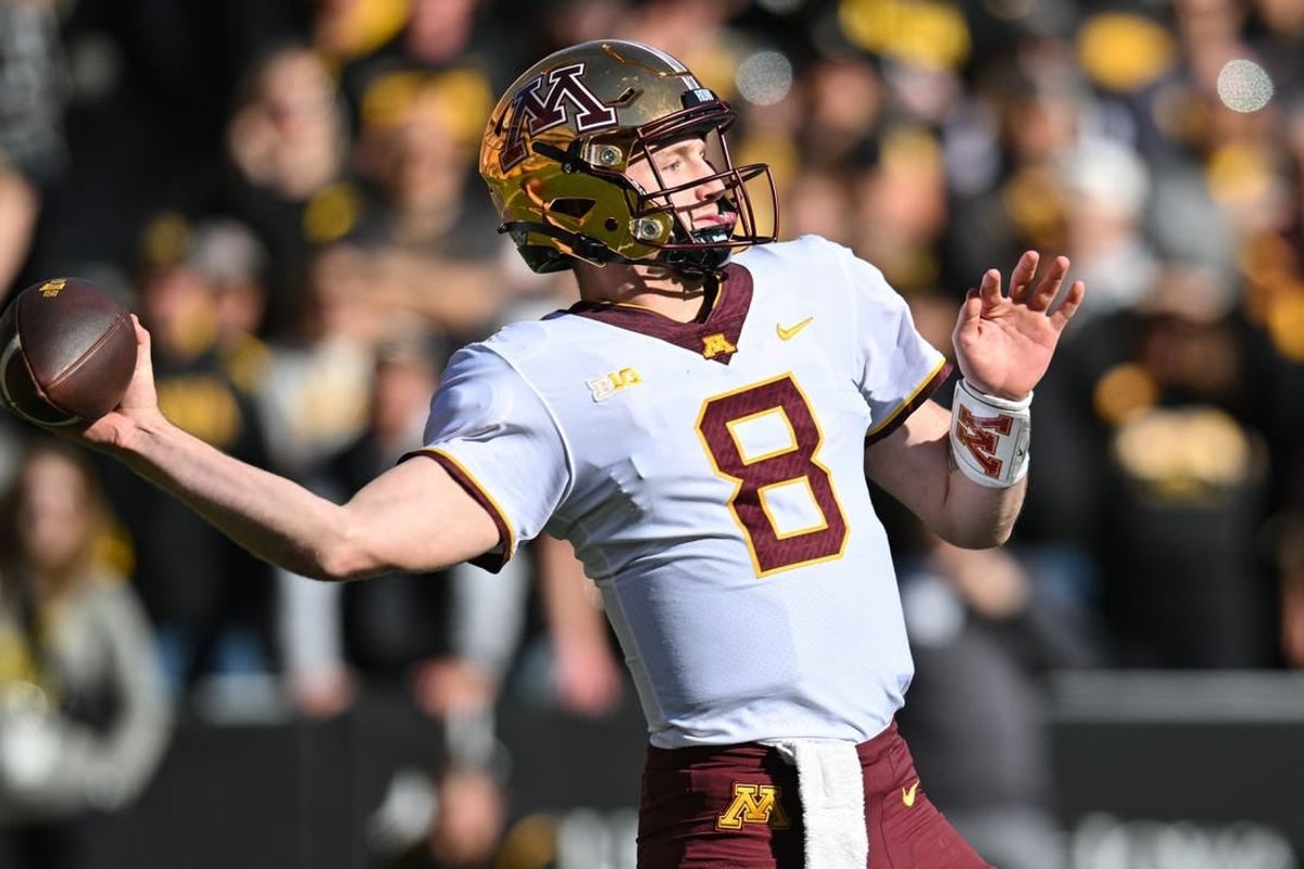 Oct 21, 2023; Iowa City, Iowa, USA; Minnesota Golden Gophers quarterback Athan Kaliakmanis (8) throws a pass against the Iowa Hawkeyes during the first quarter at Kinnick Stadium.