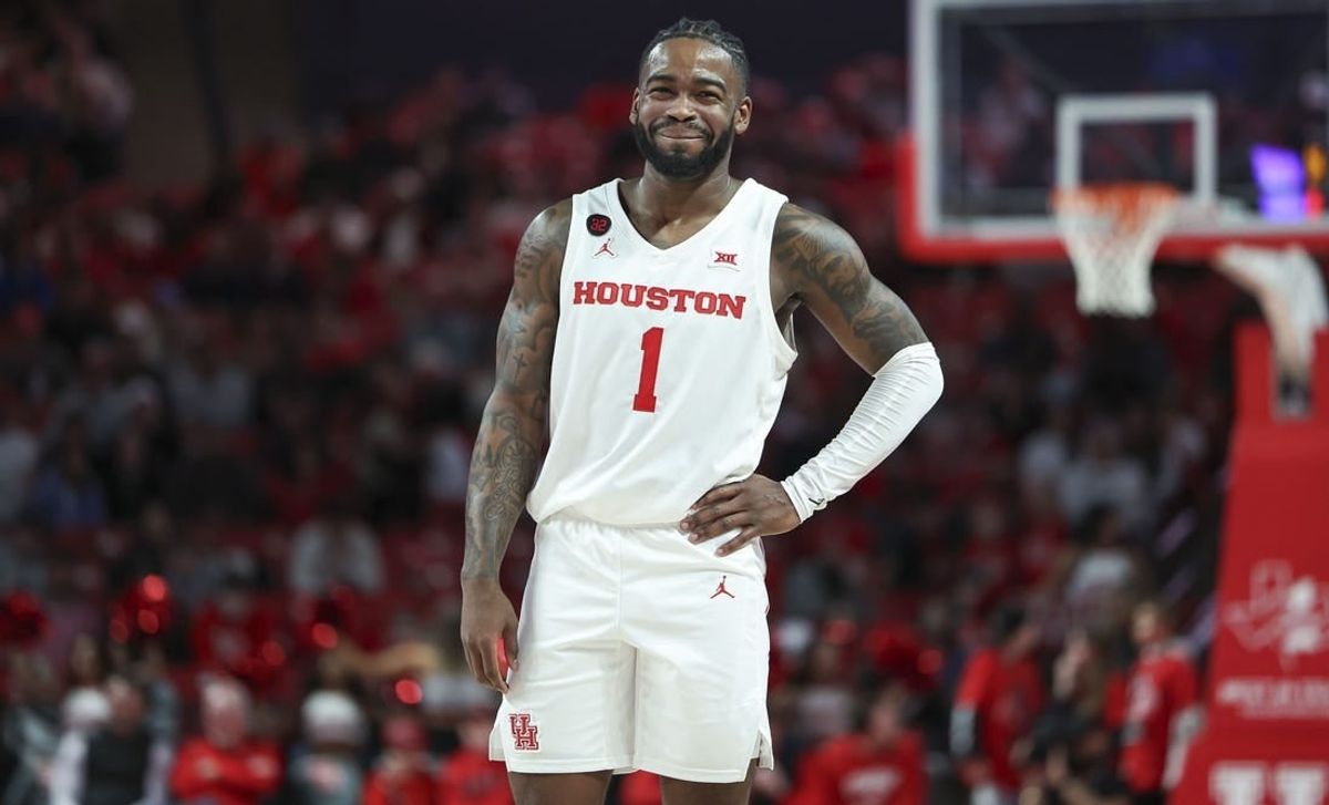 Jan 20, 2024; Houston, Texas, USA; Houston Cougars guard Jamal Shead (1) smiles after a play during the second half against the UCF Knights at Fertitta Center.