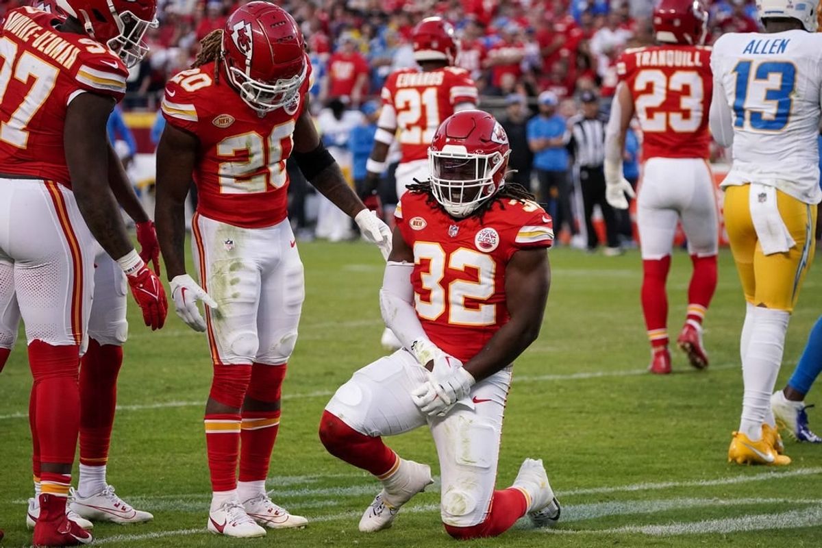 Oct 12, 2023; Kansas City, Missouri, USA; Kansas City Chiefs linebacker Nick Bolton (32) holds his wrist against the Los Angeles Chargers during the game at GEHA Field at Arrowhead Stadium.