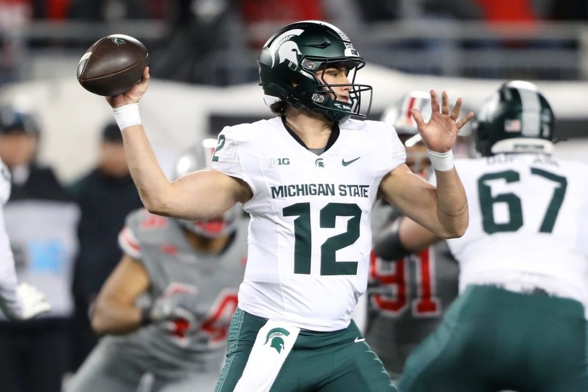 Nov 11, 2023; Columbus, Ohio, USA; Michigan State Spartans quarterback Katin Houser (12) drops back to throw during the first quarter against the Ohio State Buckeyes at Ohio Stadium.
