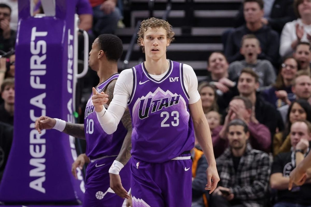 Jan 18, 2024; Salt Lake City, Utah, USA;  Utah Jazz forward Lauri Markkanen (23) reacts after scoring a basket during the second quarter against the Oklahoma City Thunder at Delta Center.
