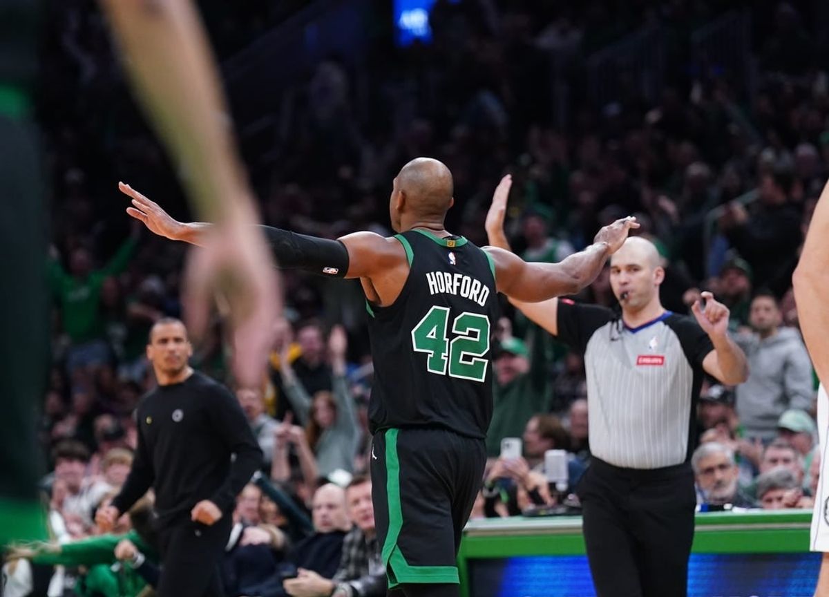 Mar 1, 2024; Boston, Massachusetts, USA; Boston Celtics center Al Horford (42) reacts after his three point basket against the Dallas Mavericks in the second half at TD Garden.