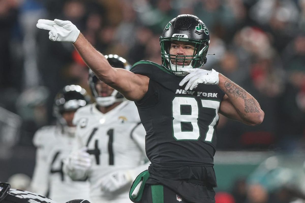 Dec 22, 2022; East Rutherford, New Jersey, USA; New York Jets tight end C.J. Uzomah (87) signals for a first down during the second half against the Jacksonville Jaguars at MetLife Stadium.