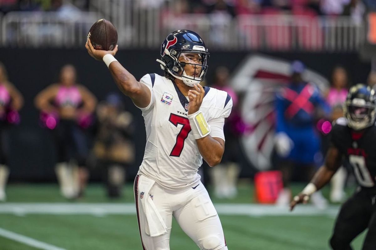 Oct 8, 2023; Atlanta, Georgia, USA; Houston Texans quarterback C.J. Stroud (7) passes against the Atlanta Falcons during the first half at Mercedes-Benz Stadium.