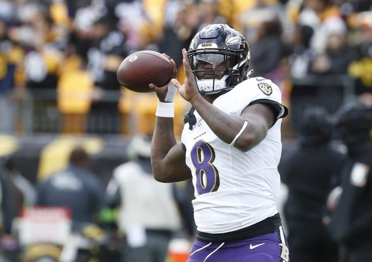Oct 8, 2023; Pittsburgh, Pennsylvania, USA; Baltimore Ravens quarterback Lamar Jackson (8) warms up before the game against the Pittsburgh Steelers at Acrisure Stadium.
