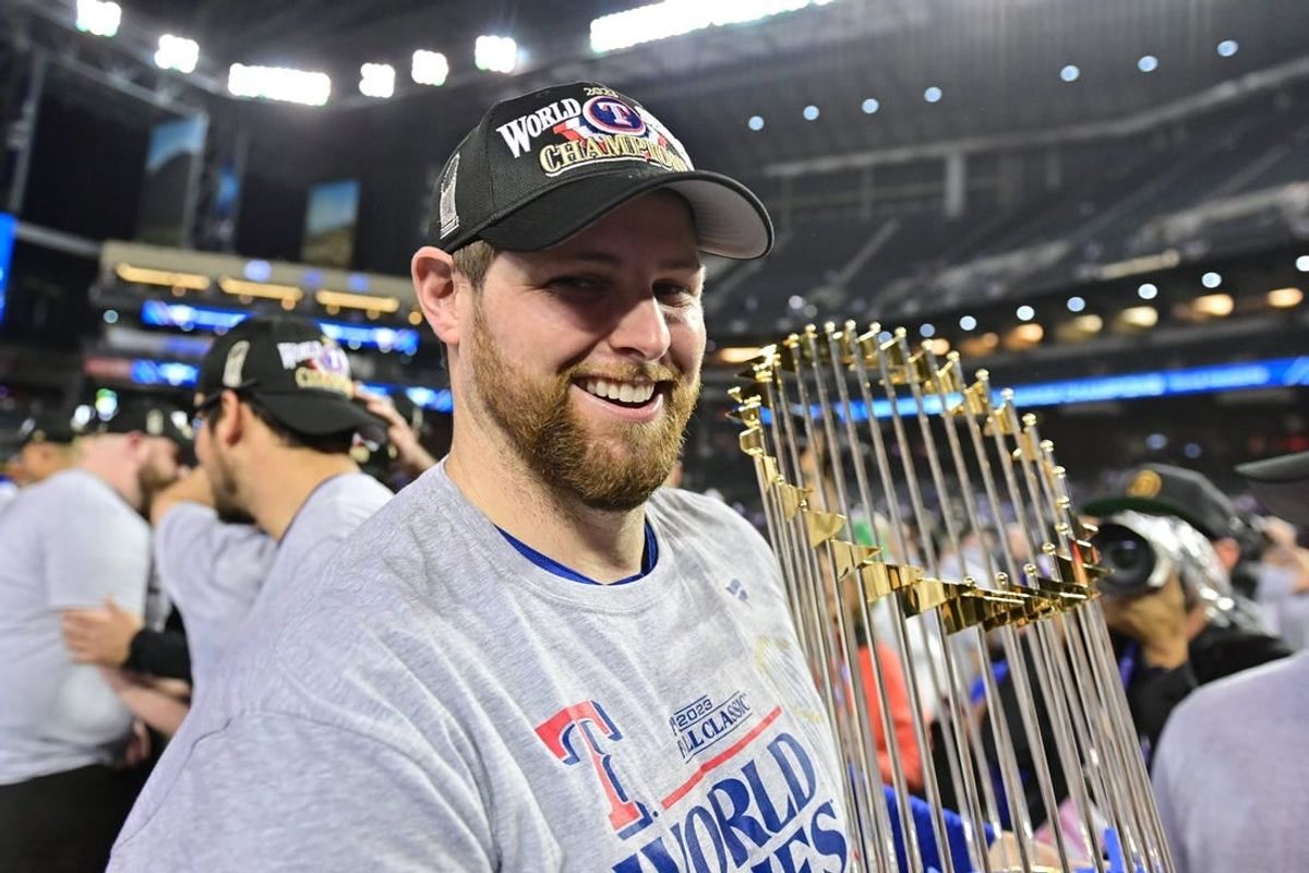 Nov 1, 2023; Phoenix, AZ, USA; Texas Rangers starting pitcher Jordan Montgomery (52) celebrates defeating the Arizona Diamondbacks to win the World Series  in game five of the 2023 World Series at Chase Field.