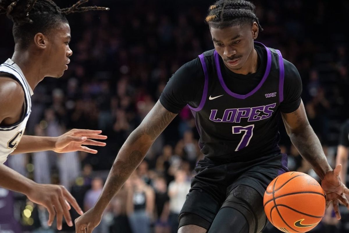 GCU guard Tyon Grant-Foster (7) dribbles the ball upcourt at Grand Canyon University Arena in Phoenix on Feb. 17, 2024.