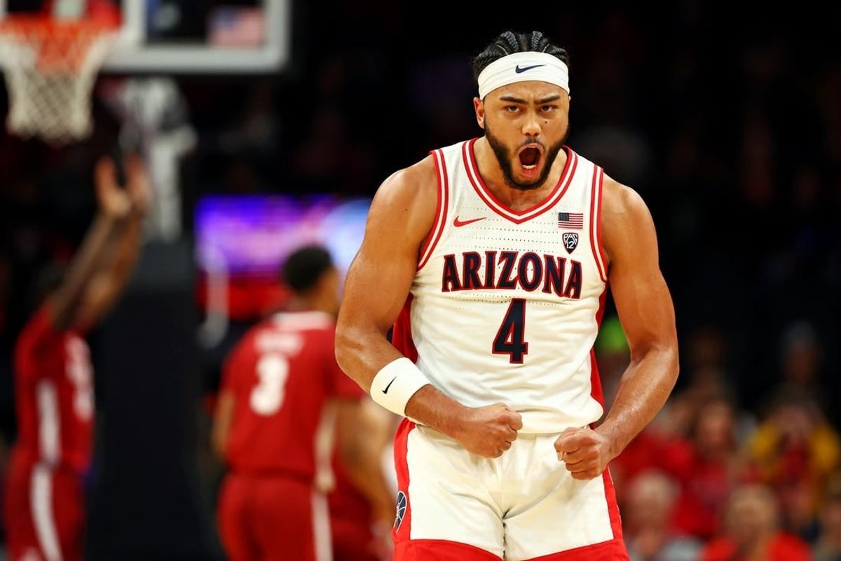 Dec 20, 2023; Phoenix, Arizona, USA; Arizona Wildcats guard Kylan Boswell (4) celebrates after a play during the first half of the game against the Alabama Crimson Tide in the Hall of Fame Series at Footprint Center.