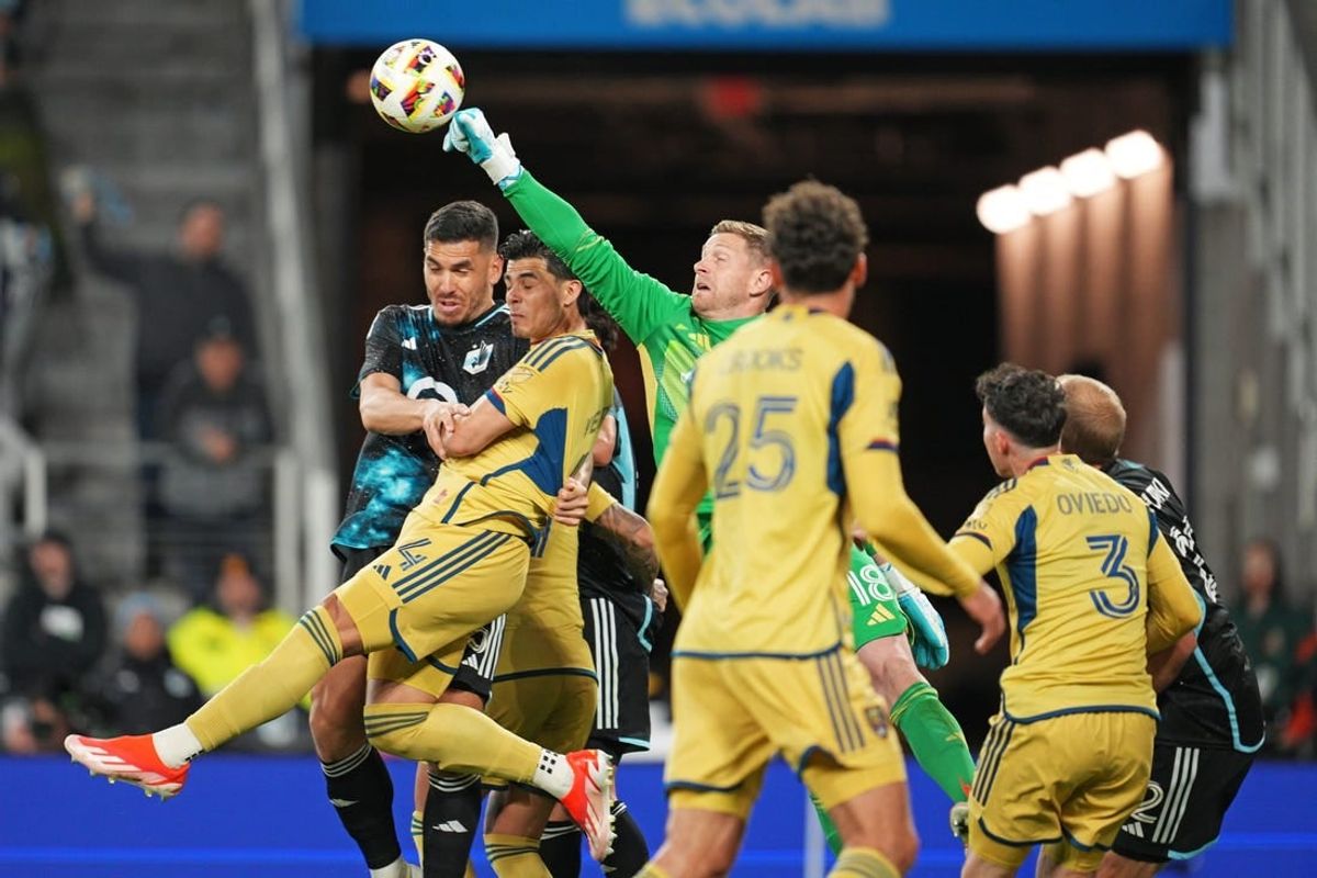 Apr 6, 2024; Saint Paul, Minnesota, USA; Real Salt Lake goalkeeper Zac MacMath (18) blocks a shot on goal by Minnesota United during the second half at Allianz Field.