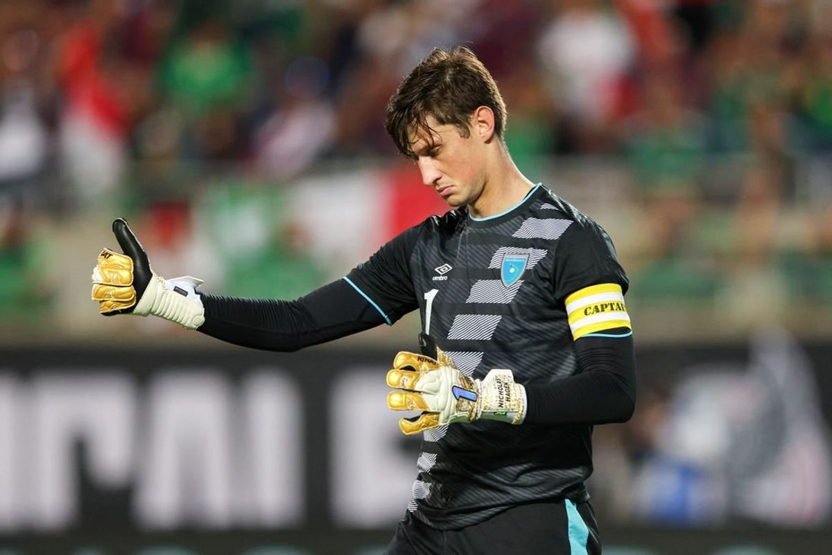 Apr 27, 2022; Orlando, FL, USA; Guatemala goalkeeper Nicholas Hagen (1) reacts after a missed free kick attempt during a match against Mexico at Camping World Stadium.