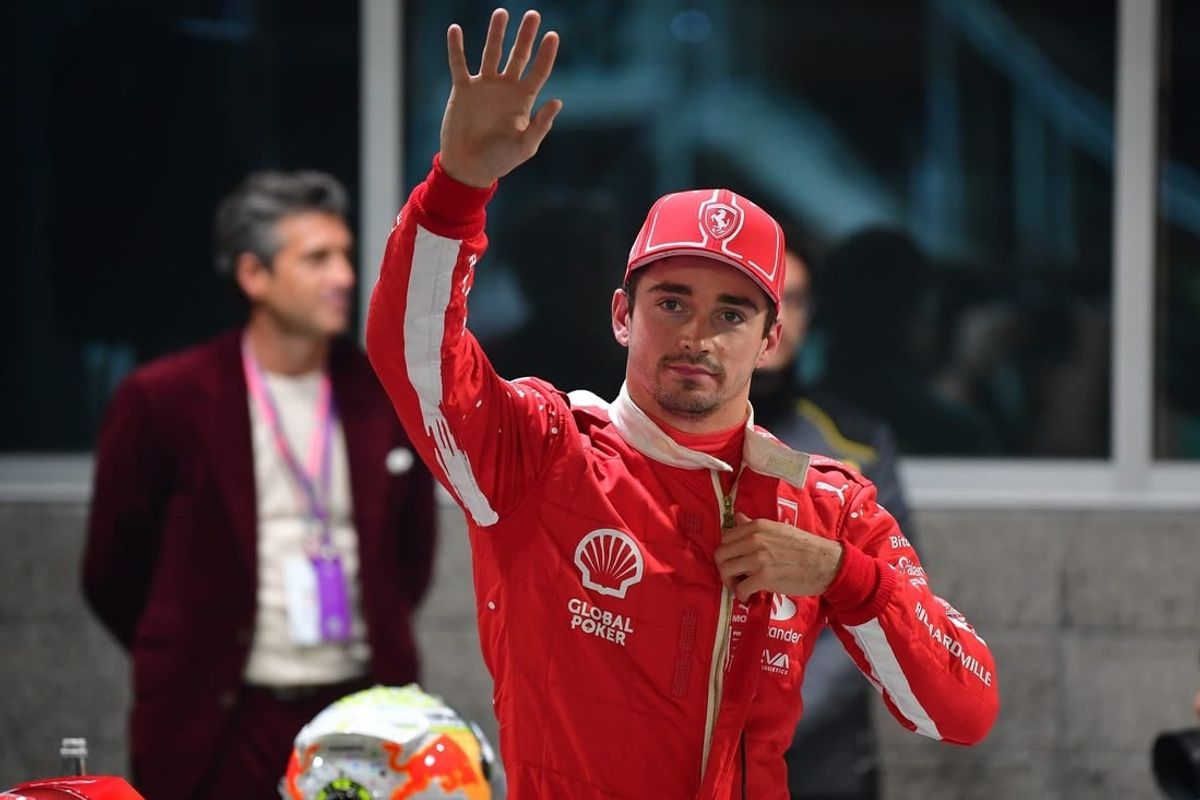 Nov 17, 2023; Las Vegas, Nevada, USA; Scuderia Ferrari driver Charles LeClerc of Monaco (16) celebrates after securing pole position during qualifying at Las Vegas Strip Circuit.