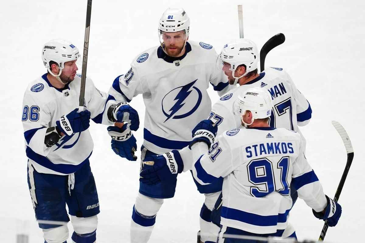 Mar 19, 2024; Las Vegas, Nevada, USA; Tampa Bay Lightning right wing Nikita Kucherov (86) celebrates with team mates after scoring an empty net goal against the Vegas Golden Knights during the third period at T-Mobile Arena.