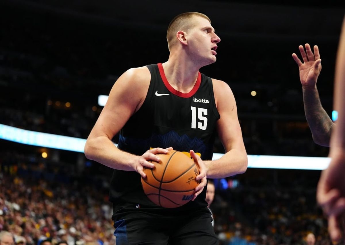 Nov 14, 2023; Denver, Colorado, USA; Denver Nuggets center Nikola Jokic (15) controls the ball in the second half against the LA Clippers at Ball Arena.