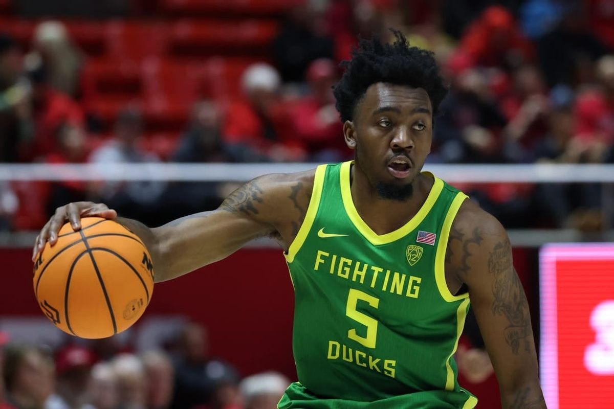 Jan 21, 2024; Salt Lake City, Utah, USA; Oregon Ducks guard Jermaine Couisnard (5) dribbles the ball against the Utah Utes during the first half at Jon M. Huntsman Center.